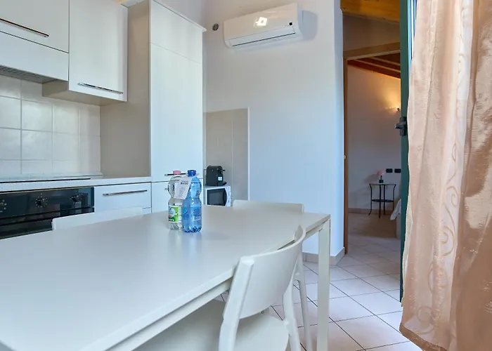 App 19 Elegante Mansarda Con Terrazzo E Parcheggio