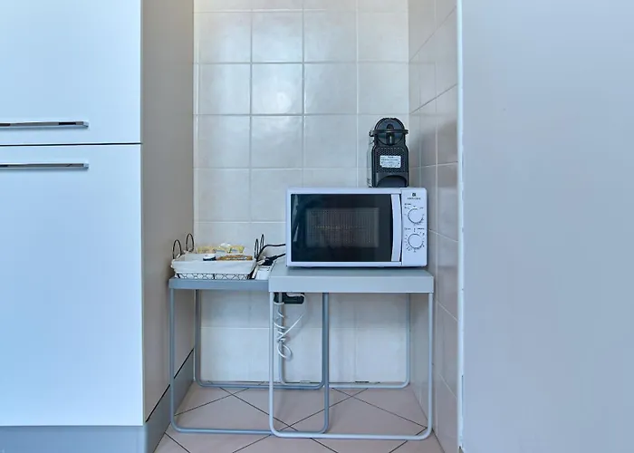 アパート App 19 Elegante Mansarda Con Terrazzo E Parcheggio モンツァ